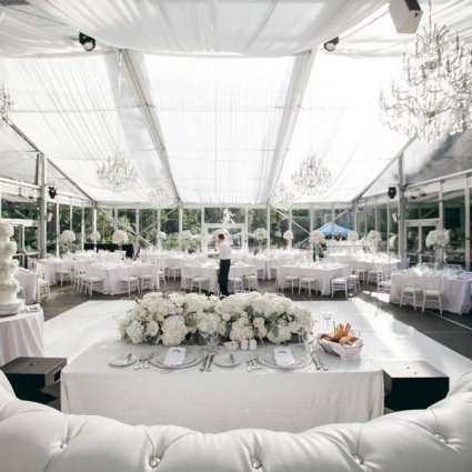 Carisma Florals featured in Laura and Tomas’ All White Wedding in Casa Loma’s Glass Pavilion