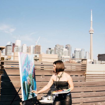 Live Wedding Painter Toronto | Olga Pankova Portrait Artist featured in Awesome Entertainment Ideas to Take Your Event to the Next Level