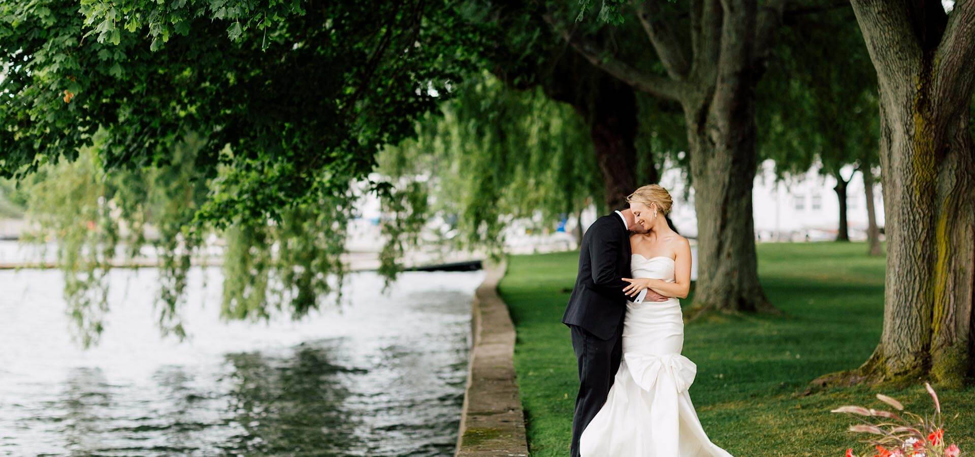 Hero image for Natalie and Adam’s Beautiful Wedding at the Royal Canadian Yacht Club