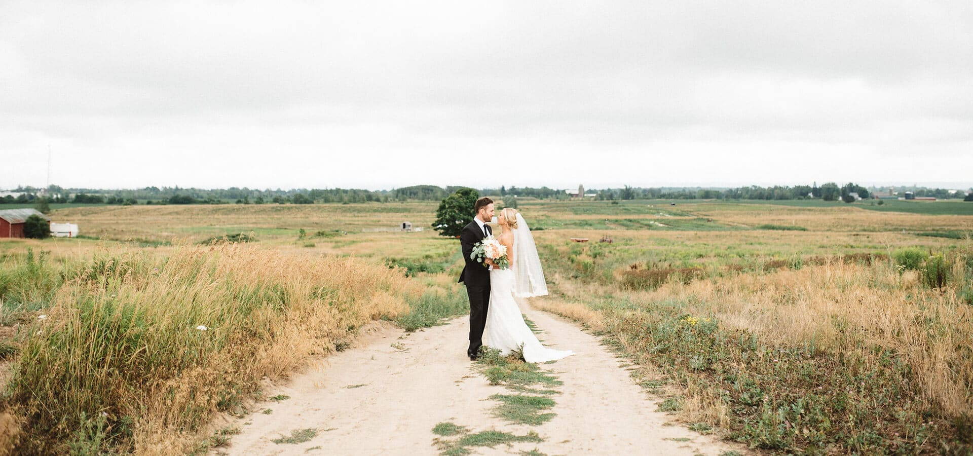 Hero image for Caitlin & Josh’s Dreamy Barn Wedding at Earth To Table Farm