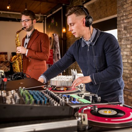 Evolved Entertainment featured in A Trendy Retro-Rustic Wedding Open House at The Jam Factory