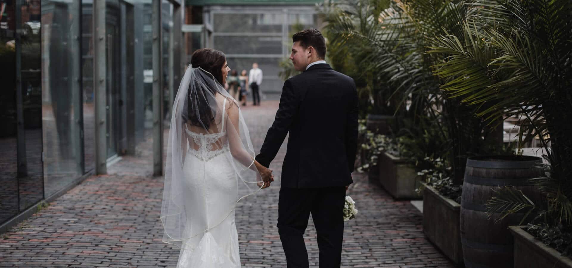 Hero image for Christin and Tyler’s Intimate ’20s Themed Wedding at Cluny Bistro