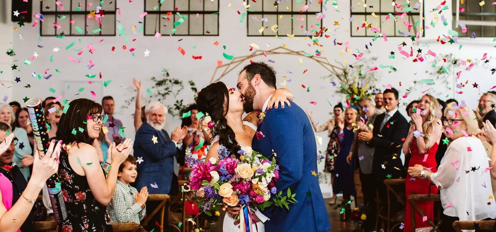 Hero image for Nicole and Luke’s Colourful Wedding at the Distillery’s Airship 37