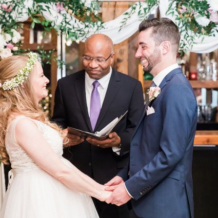 Garry Francis Officiating Service featured in Erin and Alexander’s Warm Wedding at Archeo