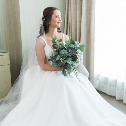 Sophie's Gown Shoppe featured in Alexandra and Anthony’s Timelessly Elegant Four Season’s Hote…