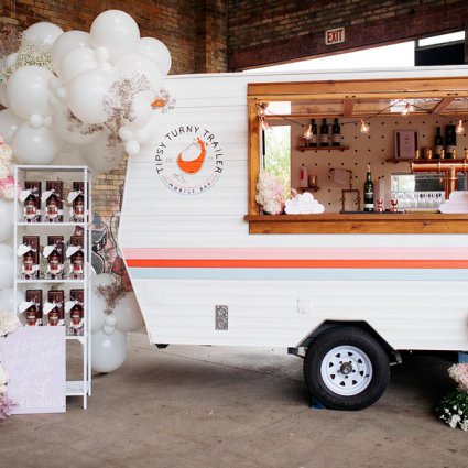 Tipsy Turny Trailer Mobile Bar featured in Love by Lynzie Presents: The Largest Pop Up Wedding Chapel To…