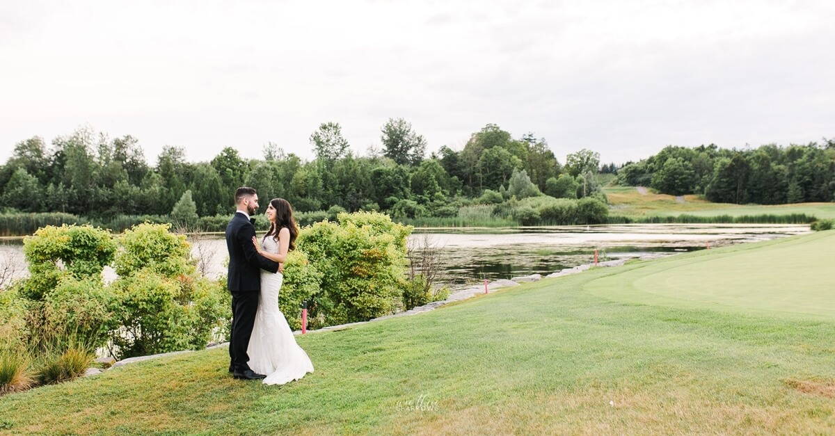 Hero image for Jessica and Christopher’s Classic White-and-Green Wedding at Eagles Nest Golf Club