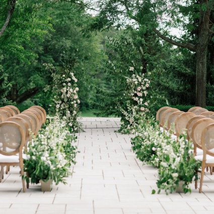 Chair-man Mills featured in Sarah and Damian’s European Style Wedding at Magna Golf Club