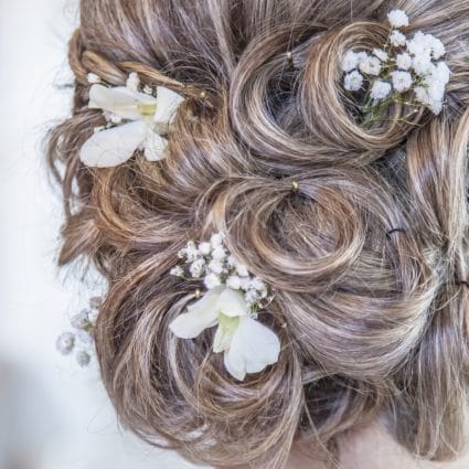 Thumbnail for To Updo or Not to Updo: The Great Wedding Hair Debate