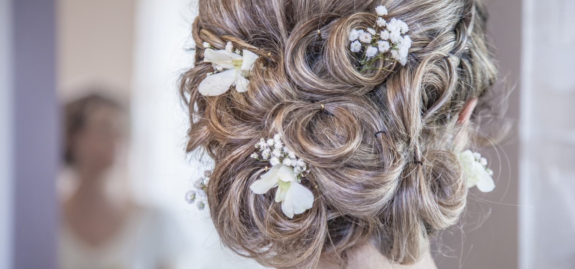 Hero image for To Updo or Not to Updo: The Great Wedding Hair Debate