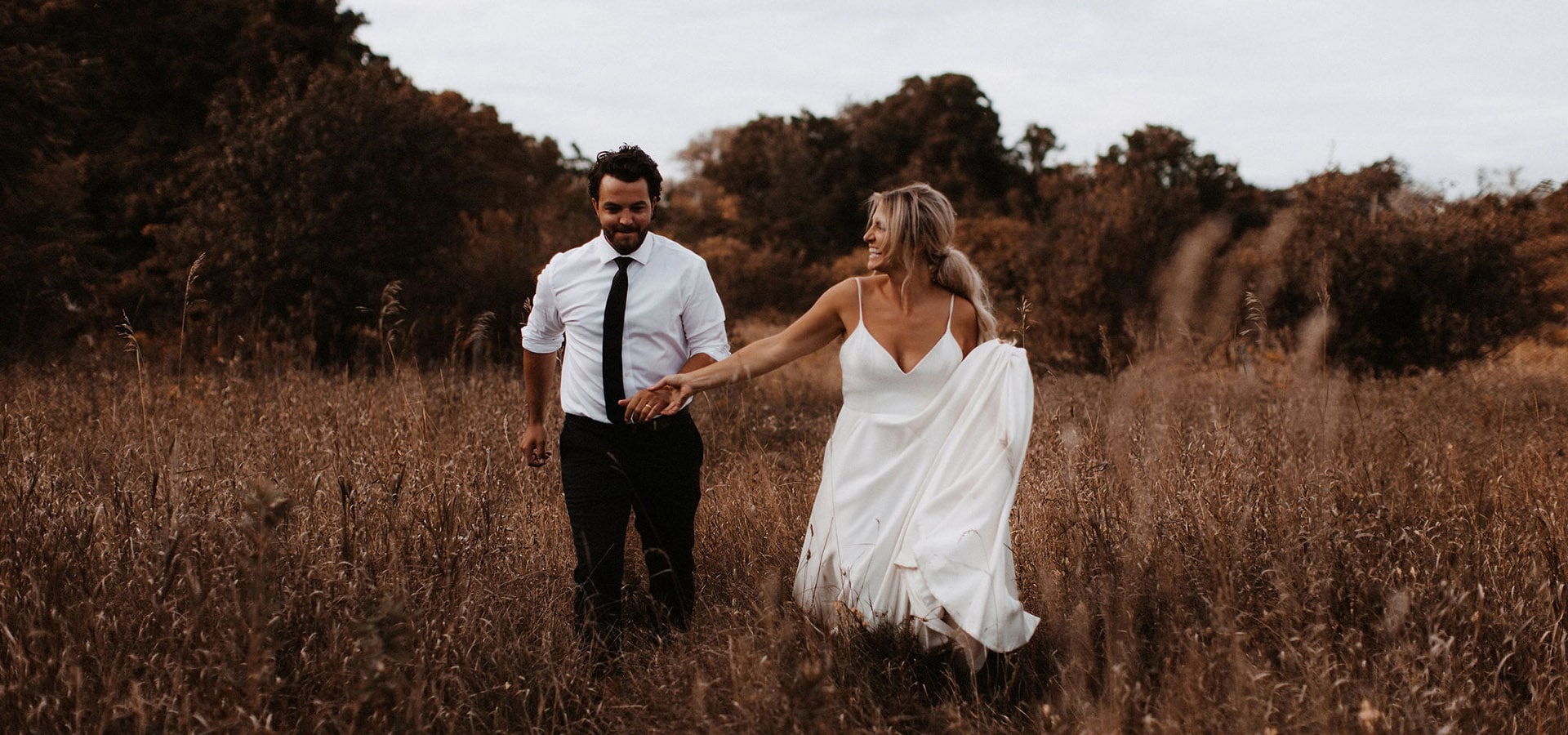 Hero image for Mike and Kaitlin’s Boho-Chic Summer Nuptials