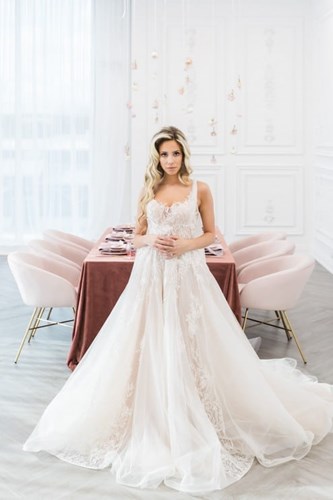 Carousel images of Feather & Pearl Bridal & Boudoir