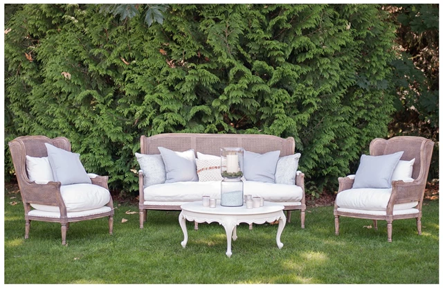 Our favorite place to perch - comfy settee & chairs layered with down filled toss cushions, makes for a sought after lounge seating.