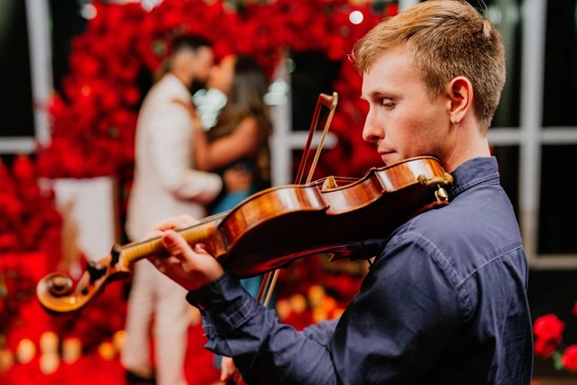 Me playing violin for a proposal