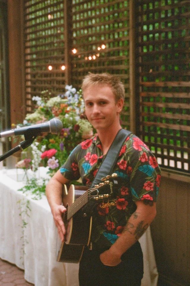 Ready to sing during the wedding cocktail hour