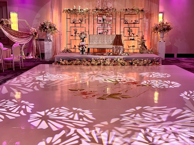 CHAMELEON EVENTS DESIGNED this engagement in blush, accents of burgundy and cream. Luxe centrepieces, round chairs, beautiful cake area and stage dripping in florals and candlelight… set the tone for this incredible night!