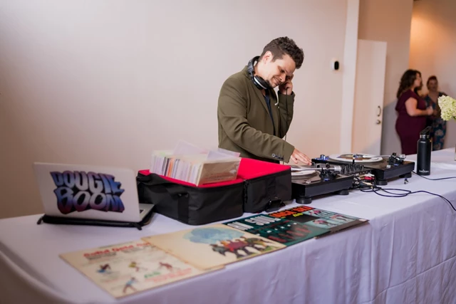 Playing 45s (Bride's request) Photo by: timothymuza.com