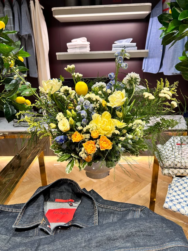 Yorkville's luxury clothing brand new collection launch, enhancing the event with sophisticated blooms that complement the brand's high-end style.