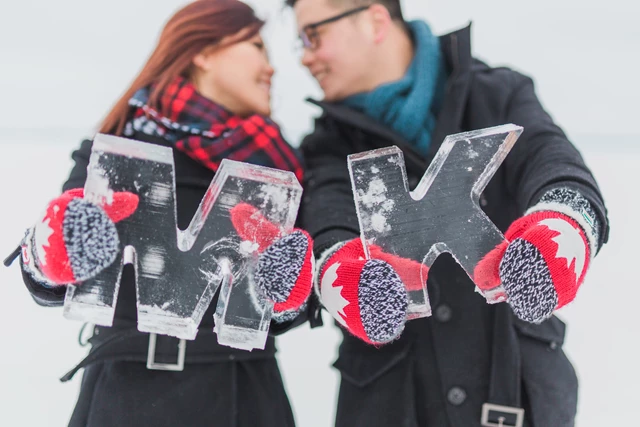 We love this cute engagement session complete with individually carved icy intials - photo cred: Rhythm Photography