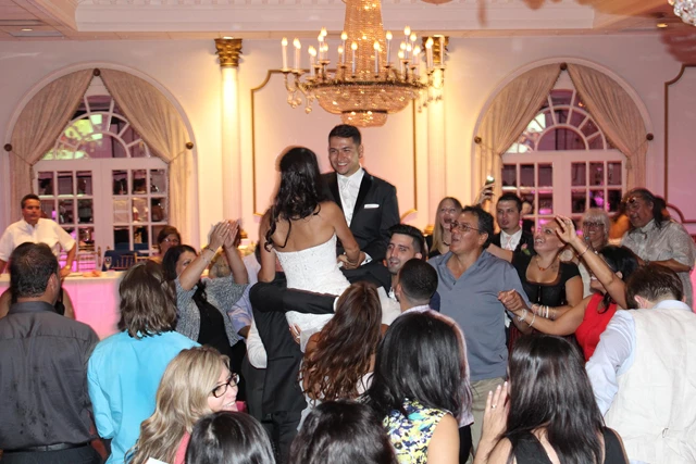 The bride and groom having the time of their lives on their wedding day.