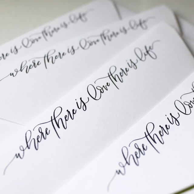 Custom calligraphy quote on envelopes