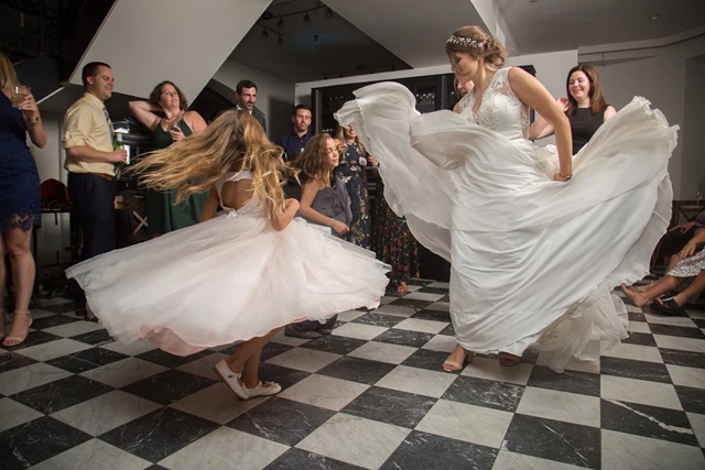 Bride and bridesmaids strutting their stuff.