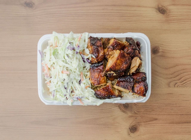 Jerk Chicken Plate with Coleslaw on Rice and Peas