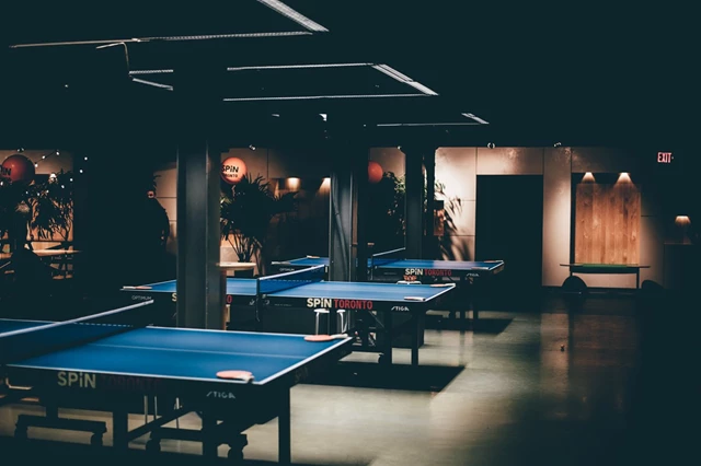 We have 12 ping pong tables!