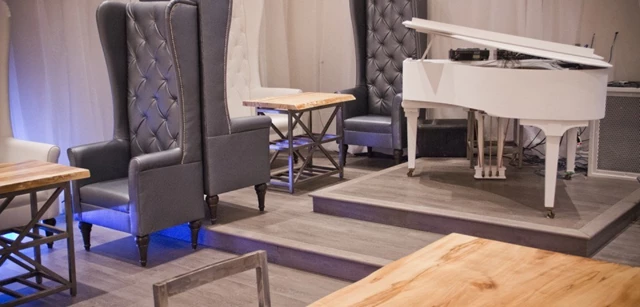 our baby grand piano can be your reception table, DJ booth or just a an accent piece of the charming decor for your event