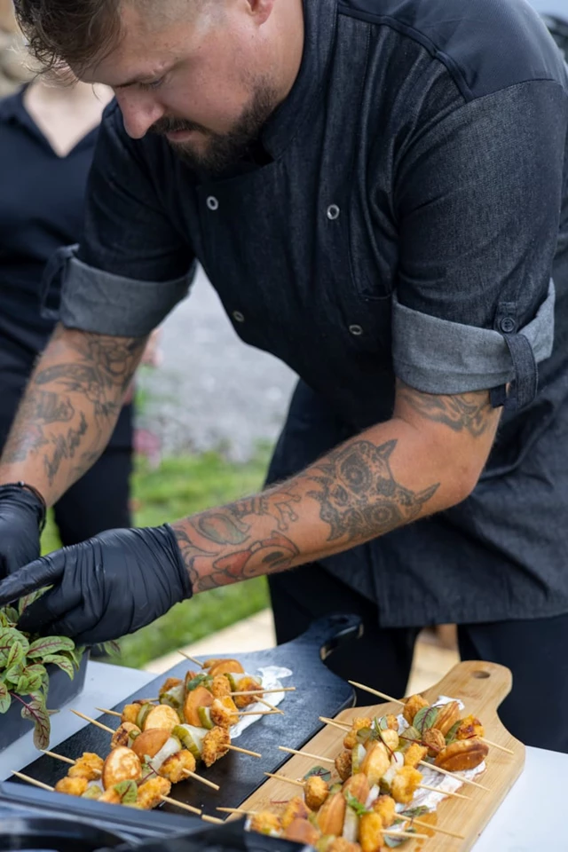 Chef plating “chicken n’ waffles” app.